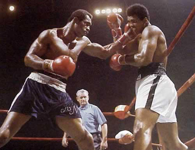 Norton sneaks one on the champ